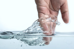 Hand on water
