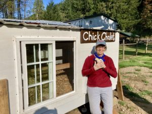Pam Johnson holds a chicken